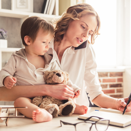 working mum at home with child